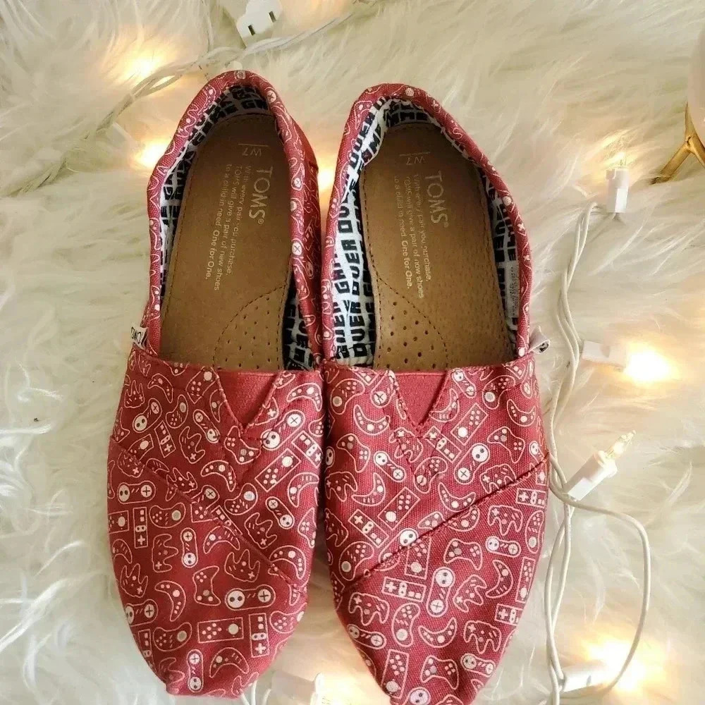 NWOT Toms Game Over Slip-Ons